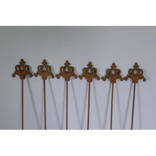 1077 - A set of six cast iron gothic style plant stakes, 106cm long