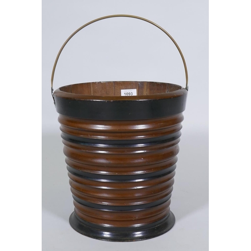 1093 - A C19th Dutch ebonised fruitwood peat bucket, 30cm high