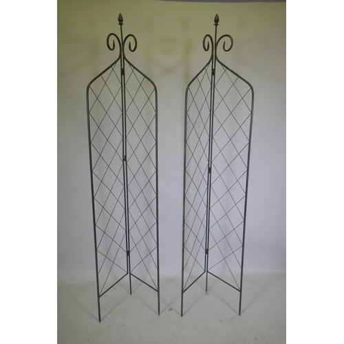 1099 - A pair of bifold metal plant supports, 212cm high