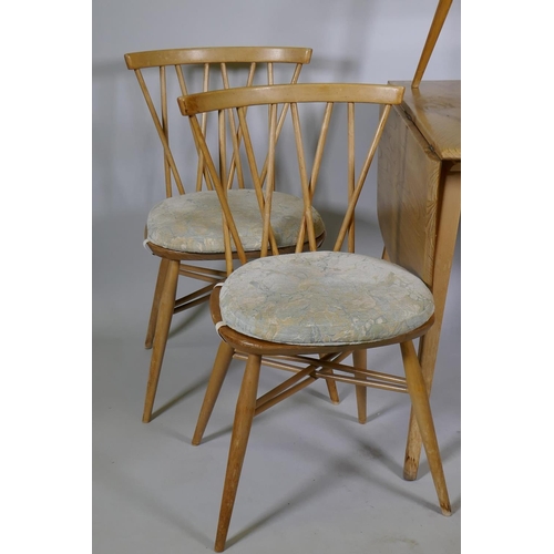 1103 - A set of four Ercol Shalstone dining chairs and blonde elm drop leaf dining table, and one Ercol cha... 