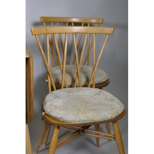 1103 - A set of four Ercol Shalstone dining chairs and blonde elm drop leaf dining table, and one Ercol cha... 