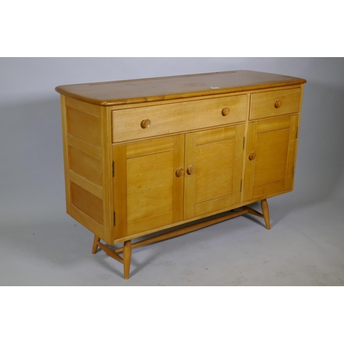 1109 - An Ercol Model 351 beech and elm top sideboard, with two drawers, one fitted with cutlery slide, ove... 