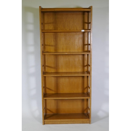 1113 - A mid-century mahogany open bookcase of six shelves, 76 x 26 x 180cm