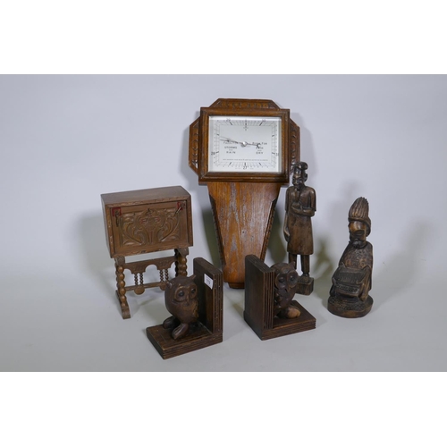 112 - A pair of carved wood owl bookends, African figures, a jewellery box in the form of an escritoire an... 