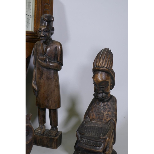 112 - A pair of carved wood owl bookends, African figures, a jewellery box in the form of an escritoire an... 