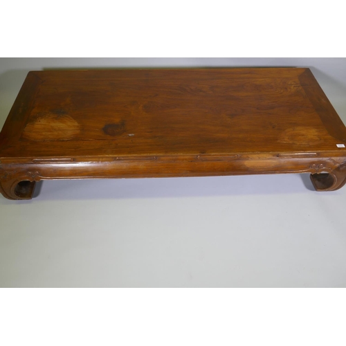 1121 - An antique Chinese hardwood low/opium table, 190 x 84cm