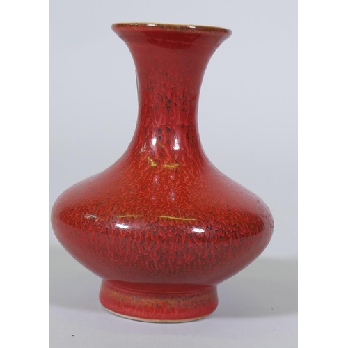 120 - A Chinese streaked red glazed ceramic vase, seal mark to base, 14cm high