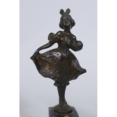 127 - Franz Iffland, a pair of bronze figures, Pierrot and a dancer, mounted on marble bases