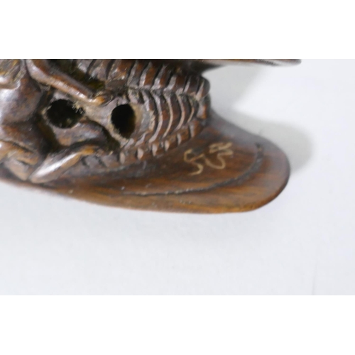 128 - A carved wood netsuke in the form of a cicada, 6.5cm long, a wood okimono of a balancing horse, sign... 