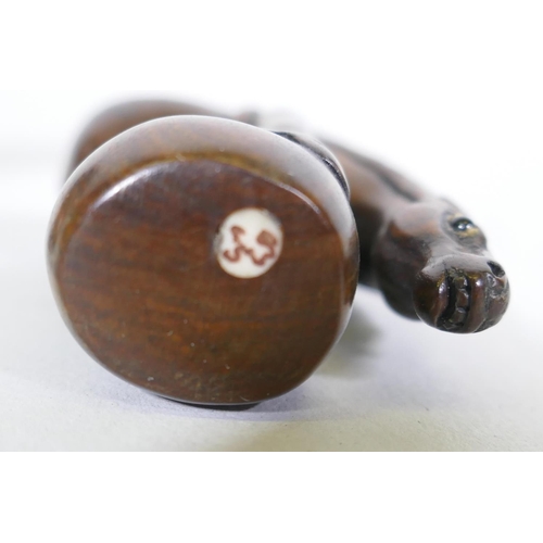 128 - A carved wood netsuke in the form of a cicada, 6.5cm long, a wood okimono of a balancing horse, sign... 