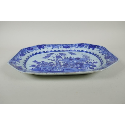 138 - A C19th Chinese blue and white porcelain export ware dish, with historic pinned repairs, 36 x 27cm