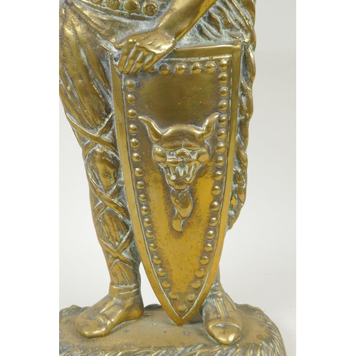 141 - A figural brass doorstop in the form of a viking, 56cm high