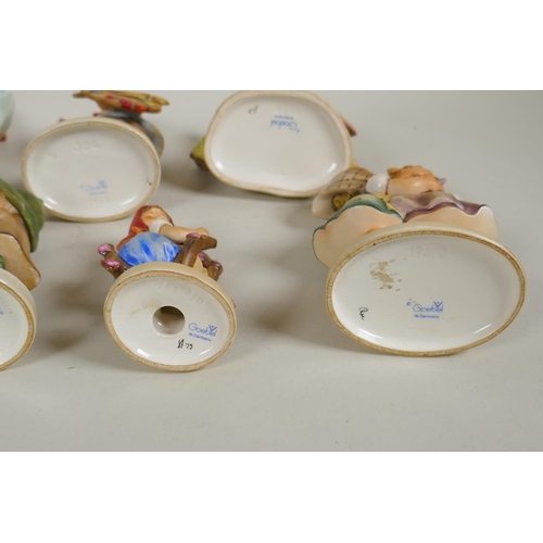 149 - Eleven vintage Goebel porcelain figures