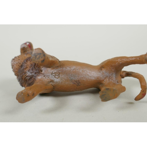 152 - An Austrian style cold painted bronze lion, after Bergmann, 10cm long