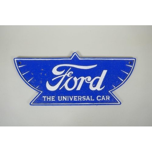 154 - A 'Ford - The Universal Car' painted cast iron wall plaque, 38cm wide