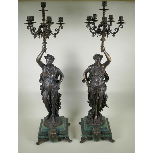 157 - After Jean-Louis Gregoire, (French, 1840-1890), a pair of Grand Tour style bronze figural five branc... 