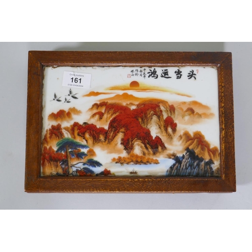 161 - A Chinese hardwood stand with inset porcelain panel, 29 x 20 x 5cm