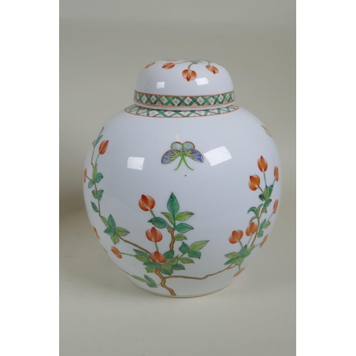 162 - A Chinese polychrome cylinder teapot decorated with birds and chrysanthemums, and a Cantonese porcel... 