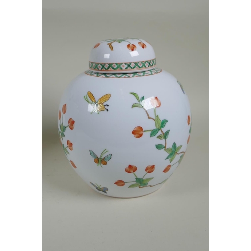 162 - A Chinese polychrome cylinder teapot decorated with birds and chrysanthemums, and a Cantonese porcel... 