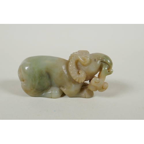 171 - A Chinese nephrite jade carving of a ram, 9cm long