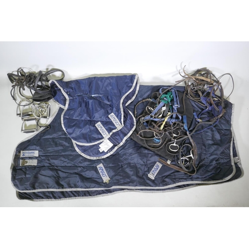 176 - A quantity of equestrian equipment including Amigo Horseware stable/under blanket, Equigel saddle pa... 