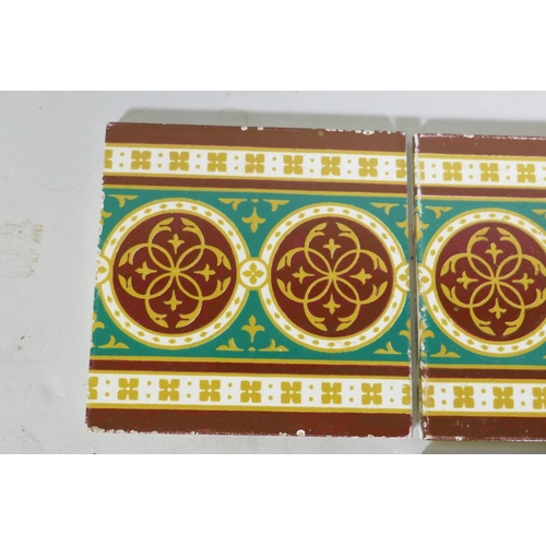 18 - A Wedgwood Etruria tile with Japanese decoration and three Minton tiles with designs after Pugin, 15... 