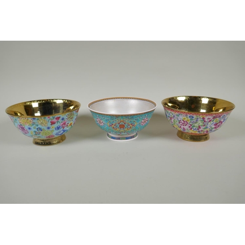 185 - A pair of Chinese gilt lustre and polychrome porcelain bowls with allover floral decoration, and ano... 