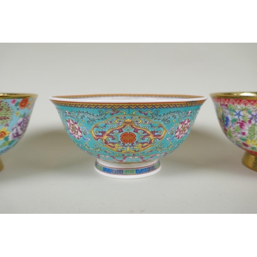 185 - A pair of Chinese gilt lustre and polychrome porcelain bowls with allover floral decoration, and ano... 