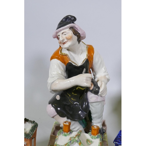 197 - A pair of Staffordshire pottery figures, the cobbler and his wife, AF, three pastille burners, and a... 