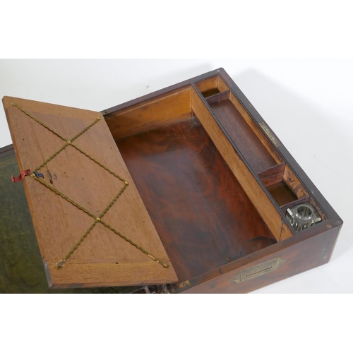 205 - A Victorian rosewood writing box with brass mounts, fitted interior with gilt tooled leather slope, ... 