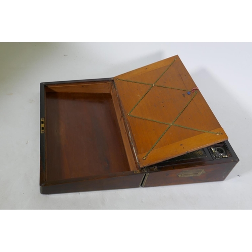 205 - A Victorian rosewood writing box with brass mounts, fitted interior with gilt tooled leather slope, ... 