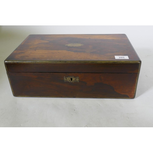 205 - A Victorian rosewood writing box with brass mounts, fitted interior with gilt tooled leather slope, ... 