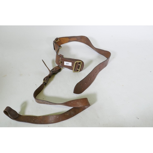 207 - A British Army Officer's brown leather belt, stamped B M & G Ltd, 1956