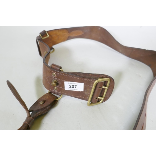 207 - A British Army Officer's brown leather belt, stamped B M & G Ltd, 1956