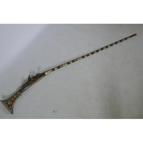 213 - A C19th North African Moukhala flintlock musket, 160cm long, AF