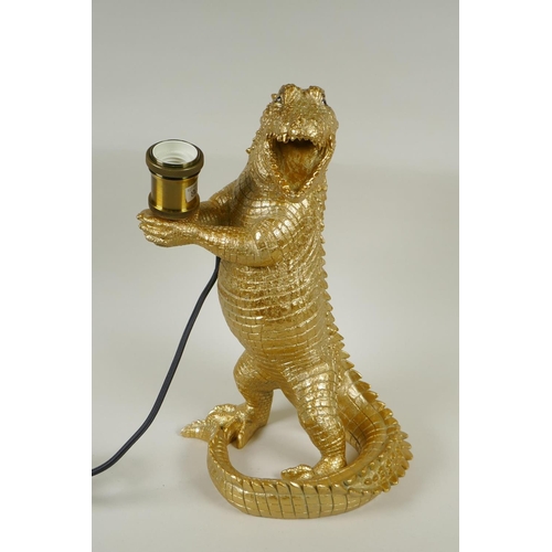 222 - A gilt composition lamp in the form of a crocodile, 38cm high