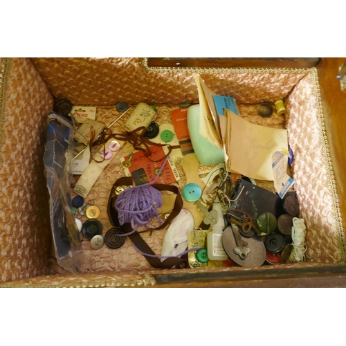 224 - An oak workbox containing vintage buttons and threads, 38 x 28 x 23cm