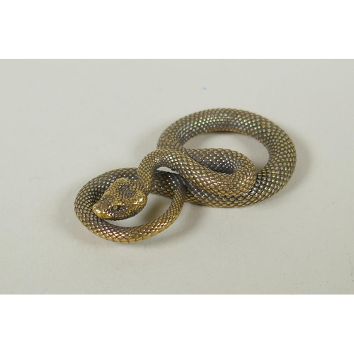 225 - A Japanese style bronze okimono of a coiled snake, 5cm long