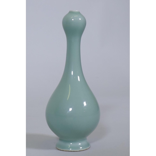 226 - A Chinese garlic head vase with celadon glaze, seal mark to base, 18cm high