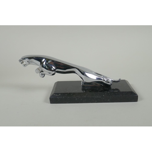 229 - A chromed metal 'Jaguar' style car mascot, on a display stand, 20cm long