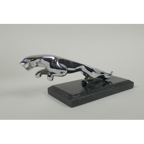 229 - A chromed metal 'Jaguar' style car mascot, on a display stand, 20cm long