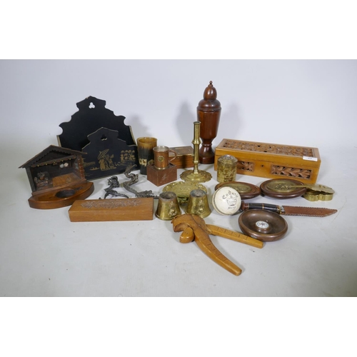 23 - A quantity of treen, a Victorian carved and pierced wood glove box, horn beakers, a Georgian petal v... 