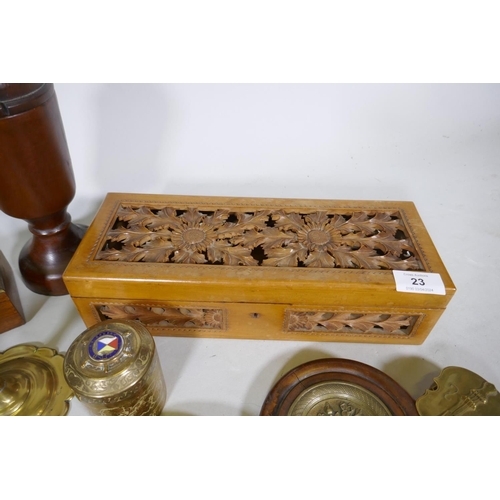 23 - A quantity of treen, a Victorian carved and pierced wood glove box, horn beakers, a Georgian petal v... 