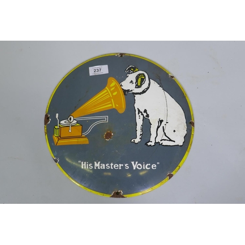 237 - An HMV vintage style enamelled metal sign, 30cm diameter