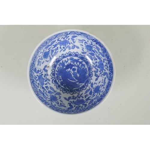 240 - A Chinese blue and white porcelain bowl with phoenix and floral decoration, Qianlong 6 character mar... 