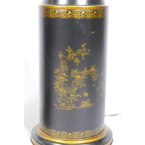 243 - A pair of toleware table lamps with parcel gilt decoration on a black ground, 82cm high