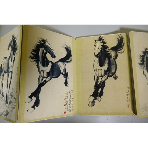 247 - A Chinese concertina book, the cardboard leaves with print of ponies and inscriptions, 28 x 18 x 11c... 