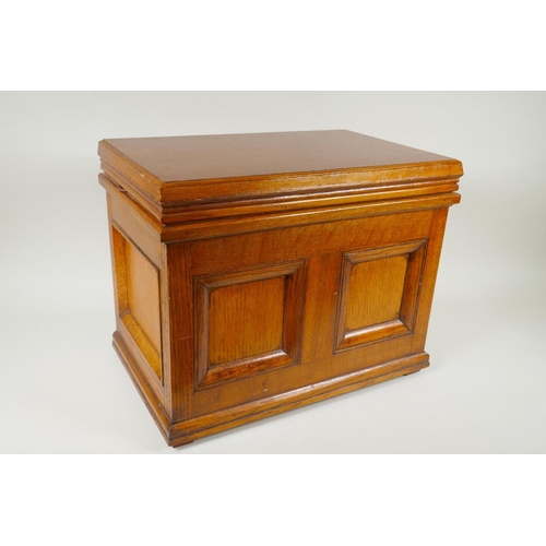 248 - A golden oak jewellery/trinket casket, 42 x 27cm, 34cm high