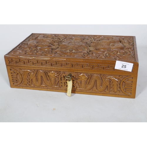 25 - A Kashmiri/Burmese carved box inscribed with the regimental badge of the Bedfordshire Regiment, and ... 