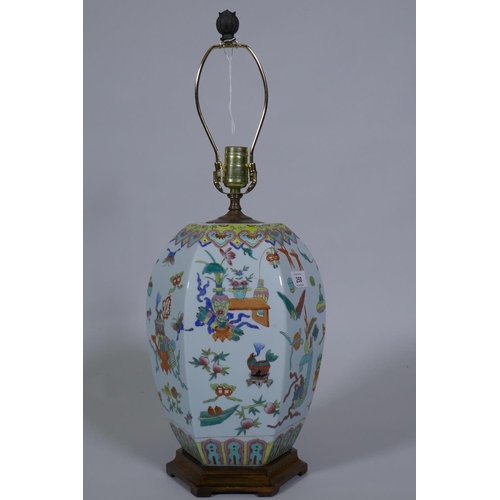 250 - A Chinese porcelain table lamp with famille verte enamel decoration, on a wood base, 64cm high